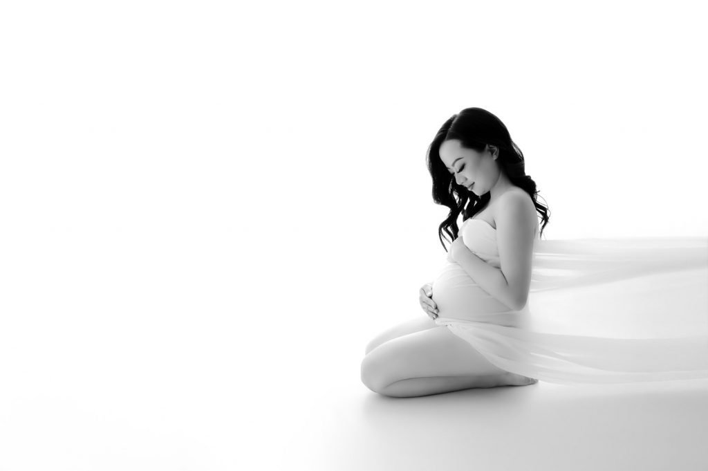 North Vancouver, Burnaby Maternity Newborn Photography pregnant woman looking down
