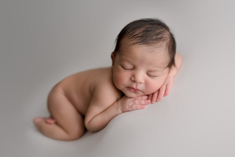West Vancouver Newborn Photography baby boy sleeping resting on his arms