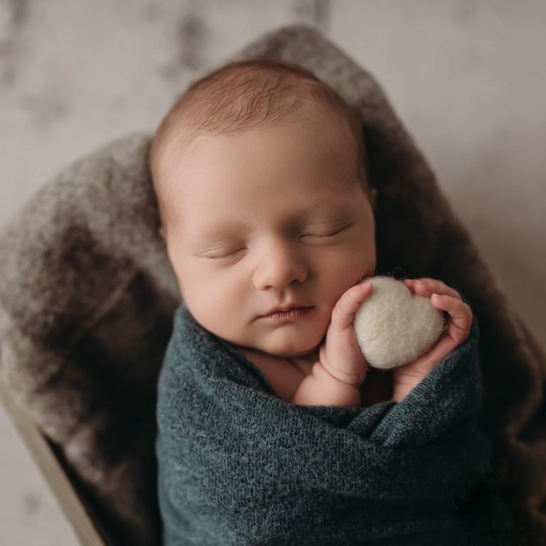 West Vancouver Newborn Photographer, baby boy holding a felt heart