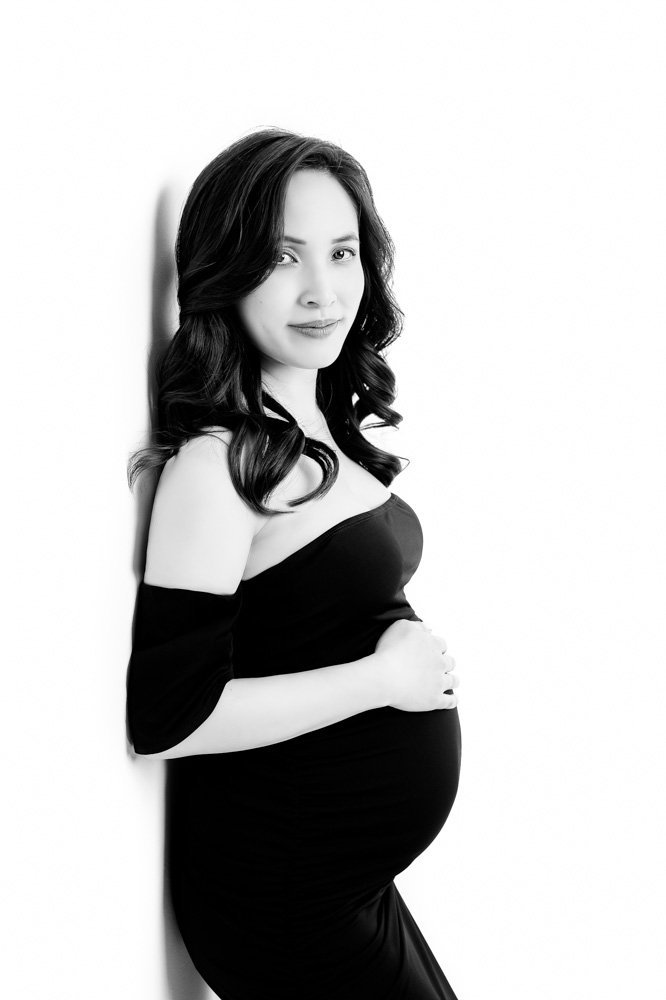 For First-Time Moms Over 40: Why Your Pregnancy Deserves to Be Celebrated 3 Image of a brunette woman holding her tummy