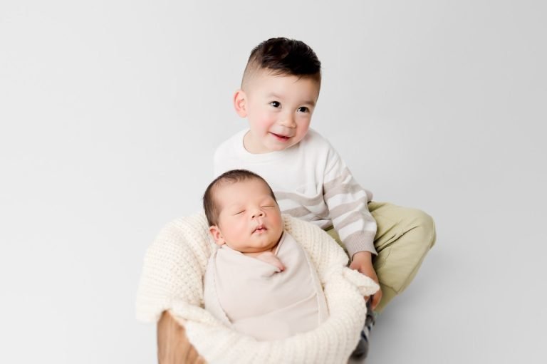 Best Vancouver Newborn Photographer siblings big brother with newborn